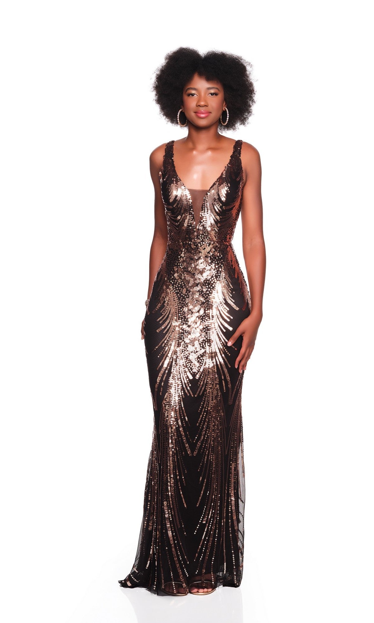 A woman with natural curly hair and gold hoop earrings wears the Long Prom Dress: Dave and Johnny 12402, a sleeveless gown featuring gold sequin patterns and a deep V neckline.